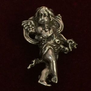 Sterling silver vintage brooch of a Cupid